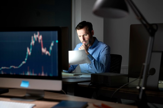 Businessman working late in office