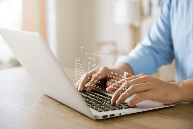 Businessman working with laptop a symbol of top service ISO Certification Document Management System Quality assurance