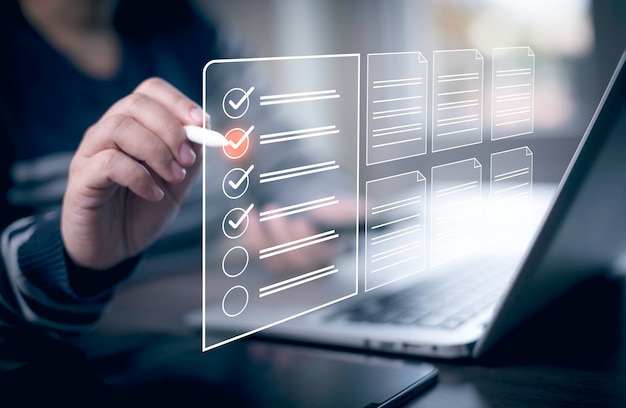Checklist and clipboard task documentation management Online survey form checklist by laptop computer Document Management Checking System online documentation database and process manage files