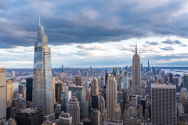 cityscape against cloudy sky