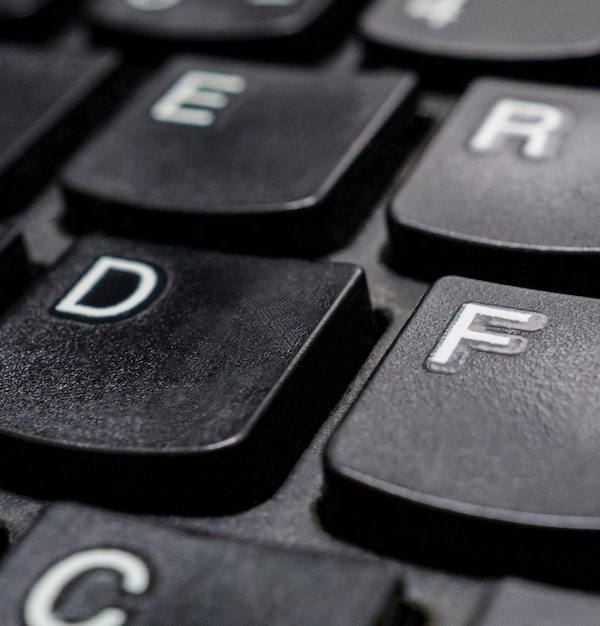 close up black computer keyboard buttons