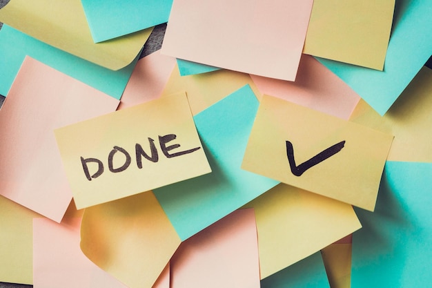 Close-up heap of adhesive note with text