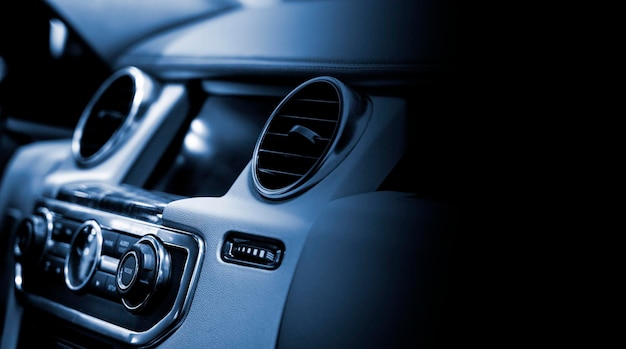 close up of a car ventilation system with black copyspace