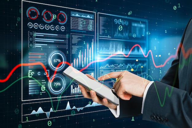 close up of businessman hand using mobile phone with glowing business chart hologram hud screen on blurry background finance trade and invest concept
