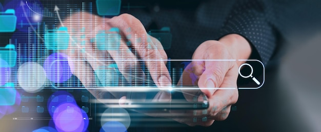 Close up of businessman hand working with mobile phone in modern office