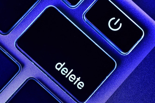 Close-up of delete text on illuminated computer key