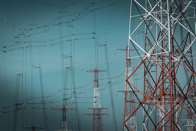 Close-up of electricity pylons against clear sky
