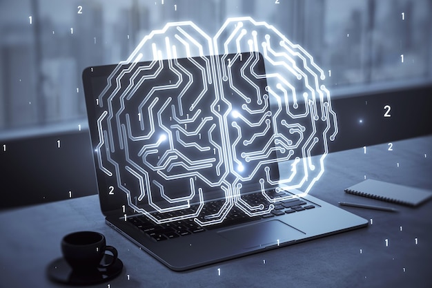 Close up of laptop computer on desktop with coffee cup and glowing human brain hologram on screen and blurry background Neurology research and artificial intelligence concept 3D Rendering