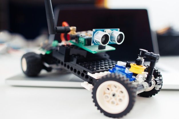Close-up of little handmade toy car.