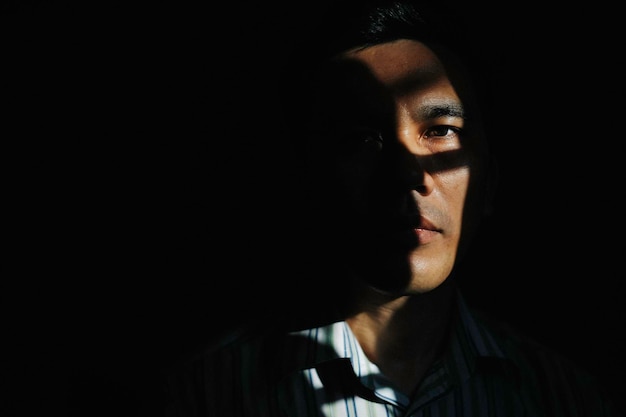 close-up of man in darkroom