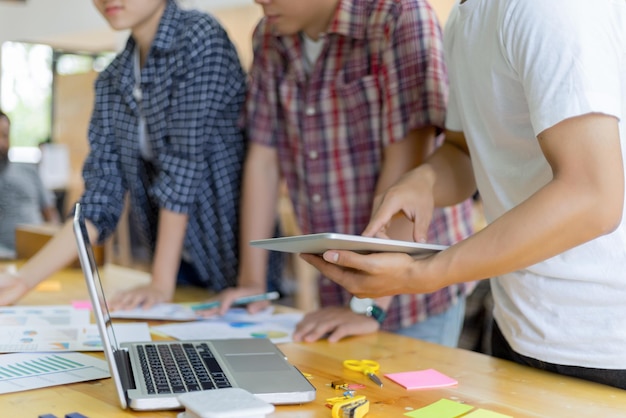 Close-up of people working in office