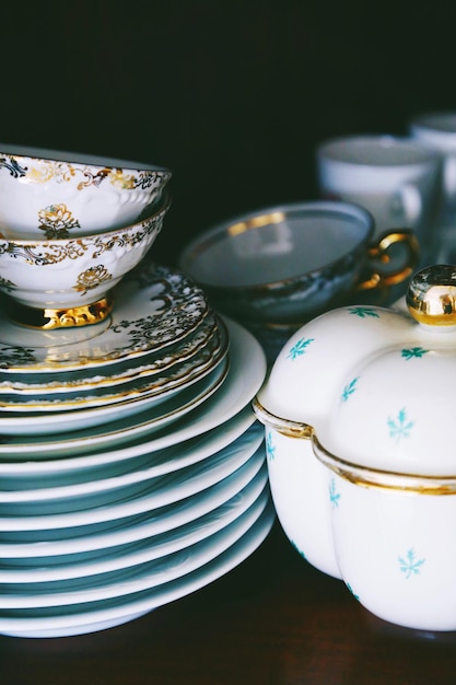 Close-up of tea cups and saucers on table