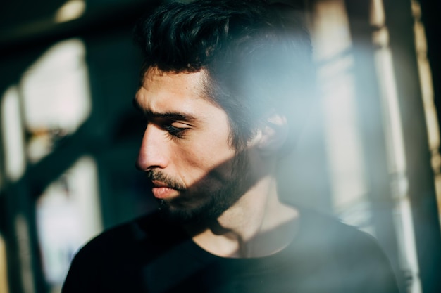close-up of thoughtful young man