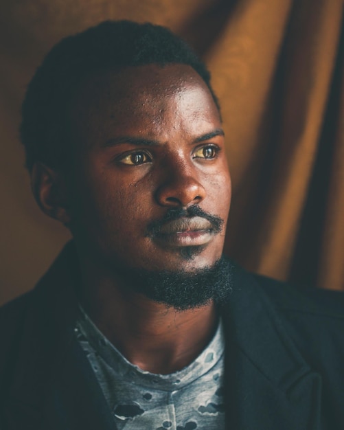 close-up of young man looking away