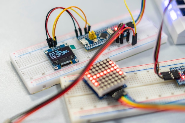 Close up person work on silicon chip or microcontoller b