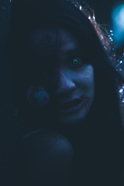 close-up portrait of spooky young woman