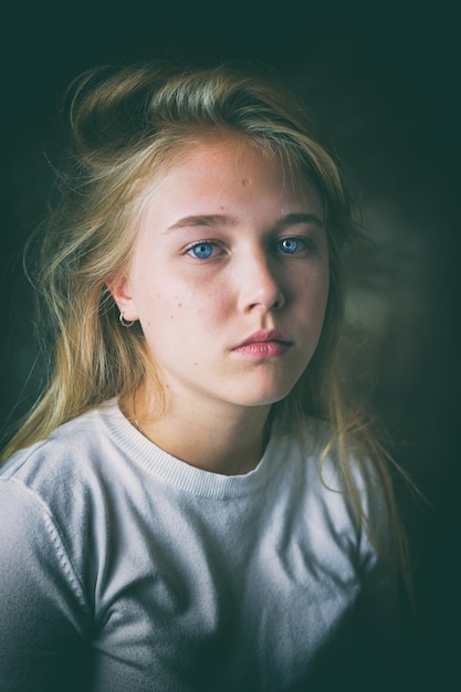 close-up portrait of teenage girl with blond hair