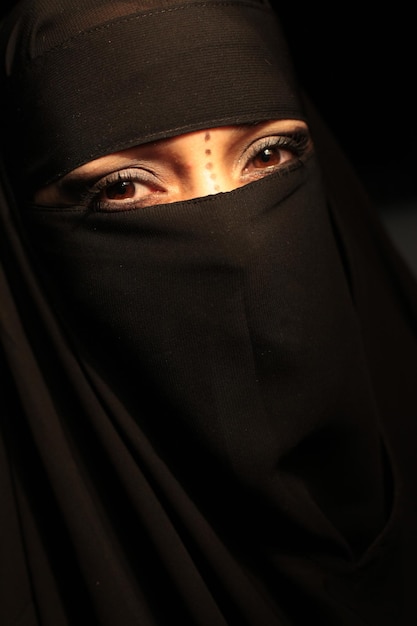 close-up portrait of woman wearing hijab