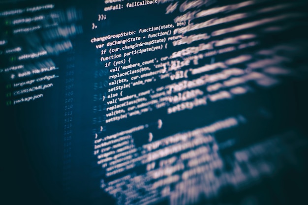 closeup developing programming and coding technologies. developer working on web sites codes in office.