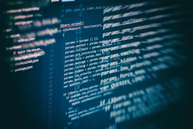 closeup developing programming and coding technologies. developer working on web sites codes in office.