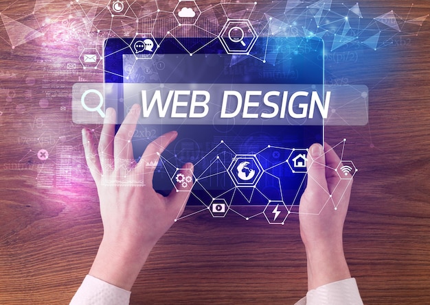 closeup of a tablet searching web design inscription hitech computing concept