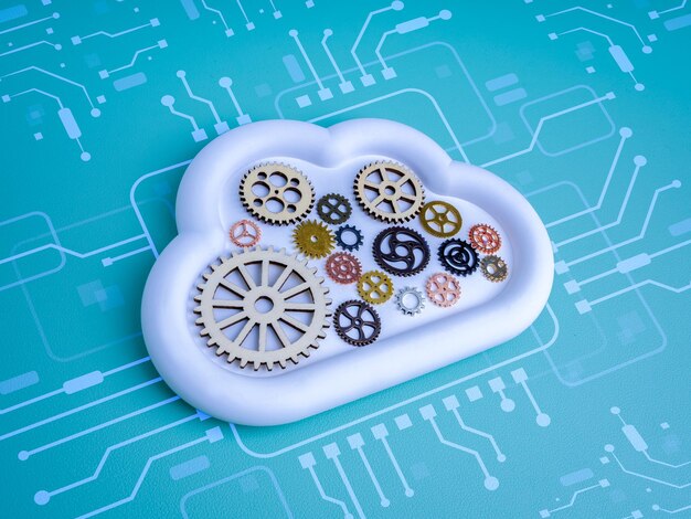 Cloud computing system concept with mechanical gears inside white cloud icon with circuit pattern symbolizing automation cloud technology management digital transformation and system integration