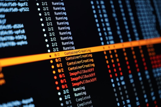 colorful terminal output showing kubernetes container statuses including running creating and error messages on dark screen background