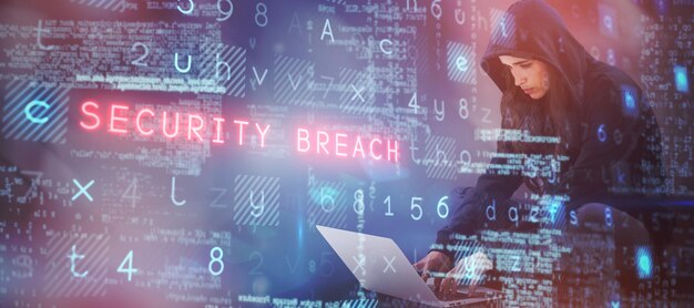Composite image of female hacker using laptop