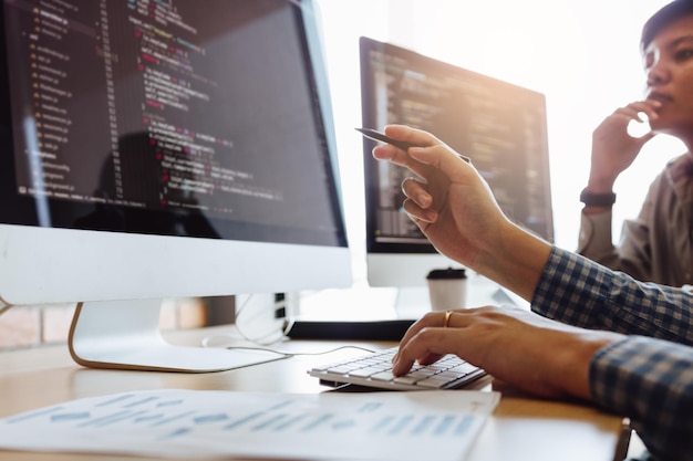 Computer programmers working in office