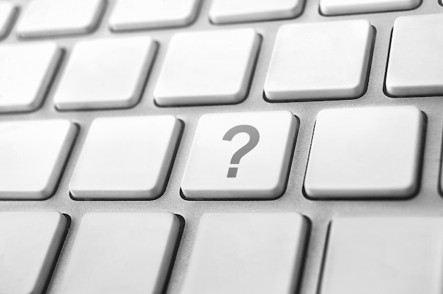 concepts of questions or computer errors with a question mark on keyboard