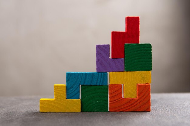 Creative idea solution business concept jigsaw puzzle on the grey background Leadership and teamwork strategy success