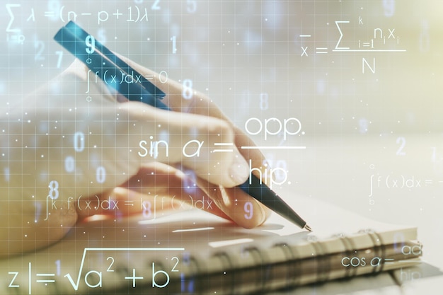 Creative scientific formula concept with woman hand writing in notebook on background Multiexposure