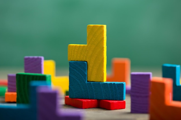 Creative solution for idea business concept jigsaw puzzle on the blackboard