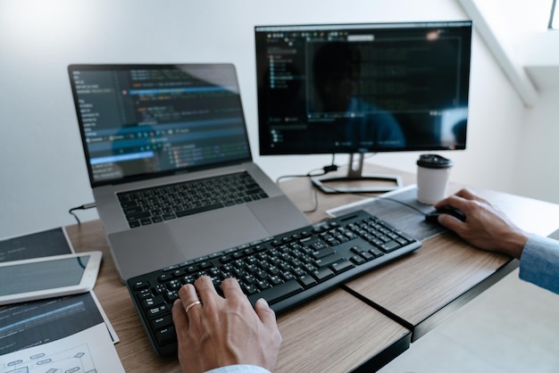 Cropped hands of person working on table