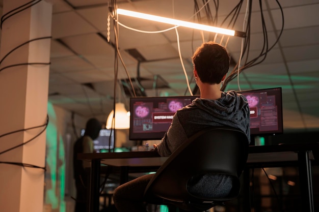Cyber attack hacker using spyware breaking into database server