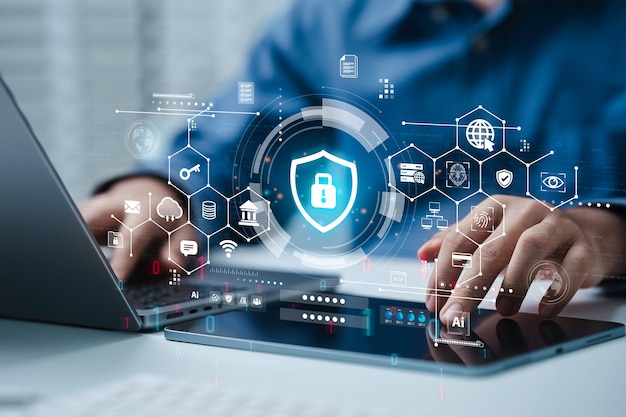 Cyber security and Data protection concept Businessman using laptop computer with Lock icon on internet network security technology Cybersecurity and privacy management on cloud computing