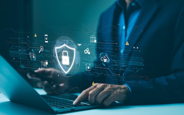 cyber security data protection concept professional using a laptop with virtual protective shield depicting online data security and cyber protection encryption privacy personal information access