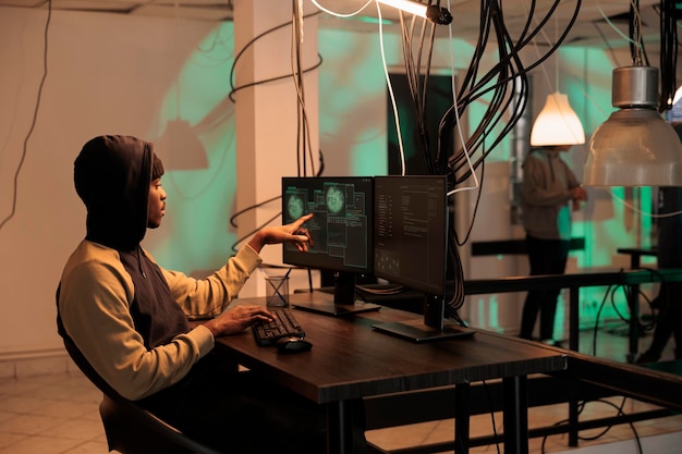 Cyber security, developer coding antivirus program, data encryption. African american it specialist programming app, cybersecurity technology, malware development, computer system protection
