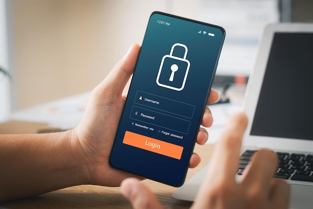 Cybersecurity internet and networking concept Close up of hand holding smartphone information security and encryption secure access to users personal information secure Internet access