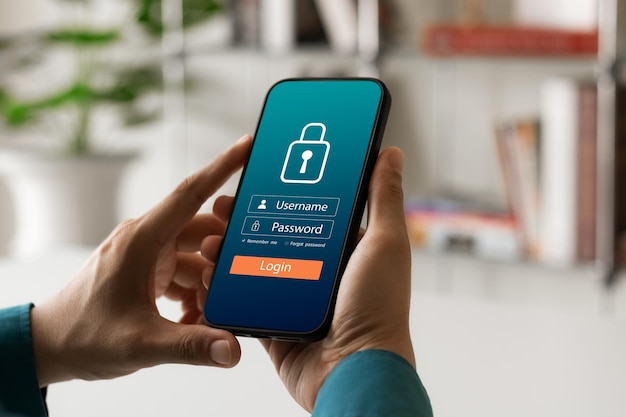 Cybersecurity internet and networking concept Close up of hand holding smartphone information security and encryption secure access to users personal information secure Internet access