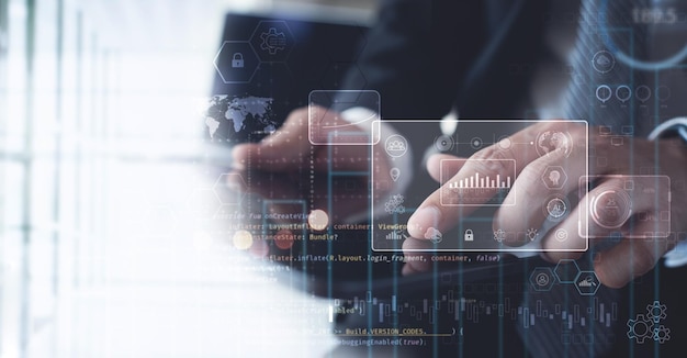 Data science Man programmer using digital tablet computer analyzing and develop software on futuristic virtual interface screen Algorithm digital marketing big data analysis and management