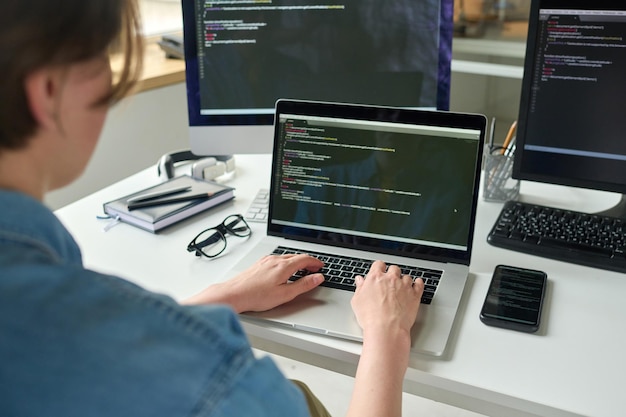Developer programming software using computer