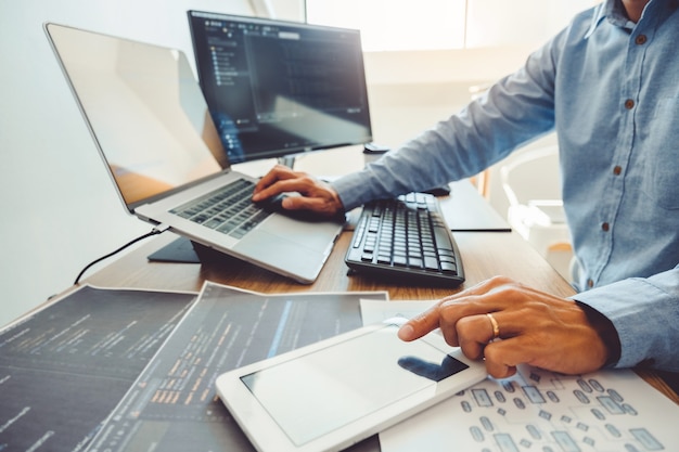 Developing programmer Development Website design and coding technologies working in software company office