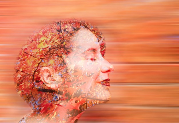 Digital composite image of human face against sunset sky