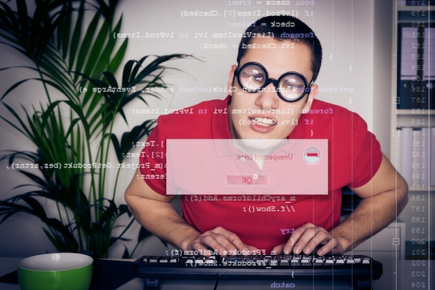 Digital composite image of young man using computer