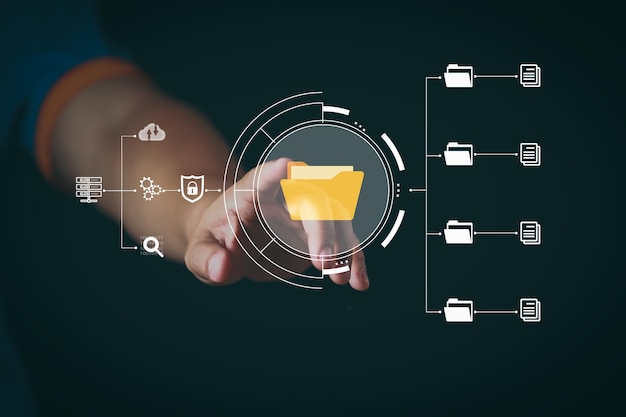 Digital hand pointing at a virtual file folder icon with futuristic interface representing data storage cloud computing information management and secure document organization in technology