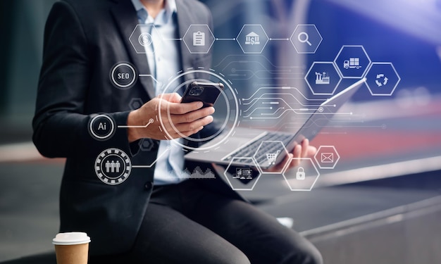 digital marketing media in virtual screenbusinessman hand working with mobile phone and modern compute with vr icon diagram at office in morning light