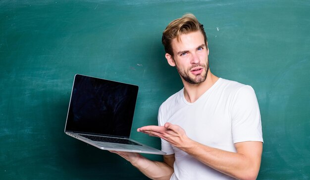 Digital technology Apply online course for programmers Programming web development Student learn programming language School teacher programming with laptop Handsome man use modern technology