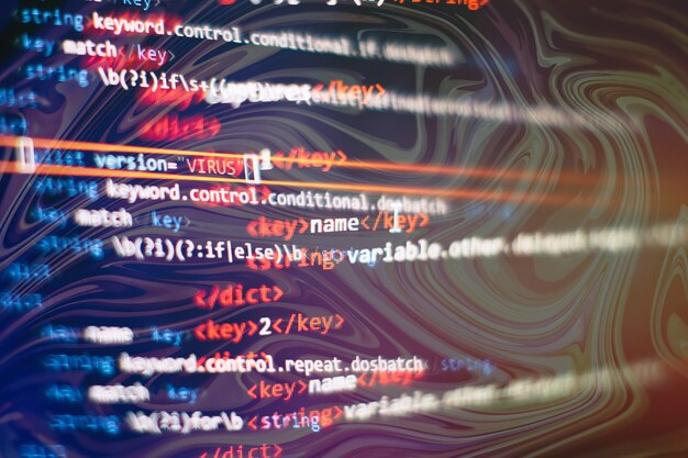 Digital technology on display. HTML5 in editor for website development. Website HTML Code on the Laptop Display Closeup Photo.