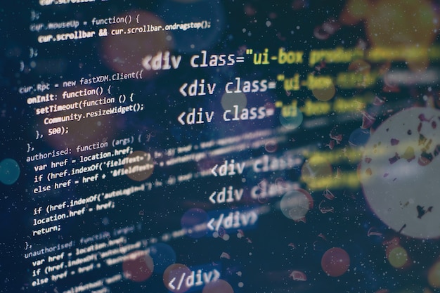 Digital technology on display. HTML5 in editor for website development. Website HTML Code on the Laptop Display Closeup Photo.